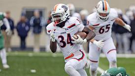 Ammar Banire, Oswego defense spark second-round victory over Lane Tech