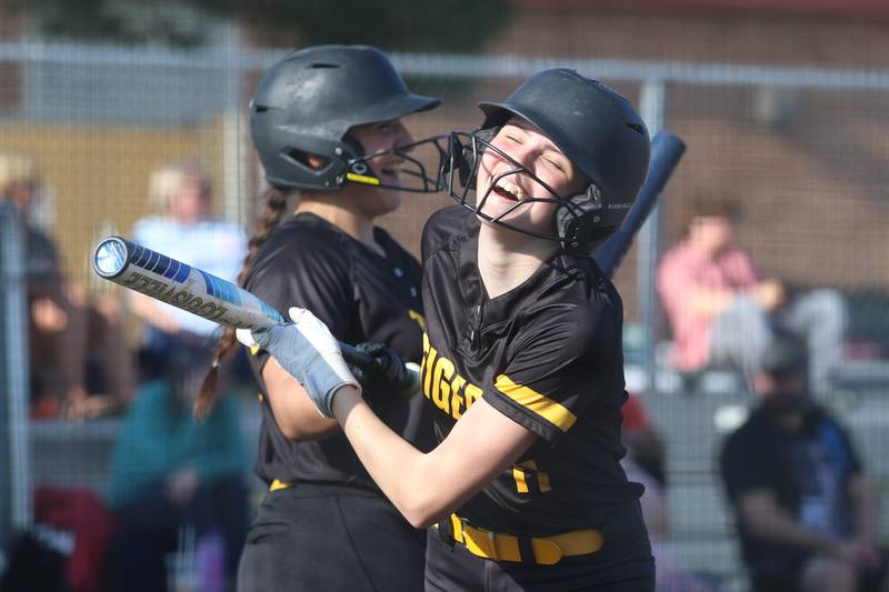 Joliet West’s Caitlin Jadron (11) shares a laugh with Gabriela Juarez after scoring against Joliet Central on Wednesday, April 22, 2026 in Joliet.