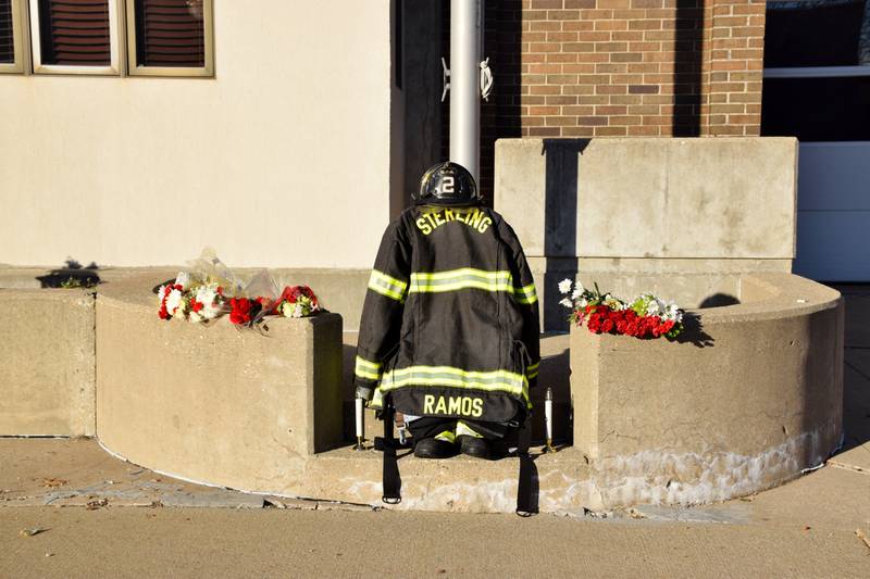 A memorial to Garrett Ramos is located outside Sterling Fire Department