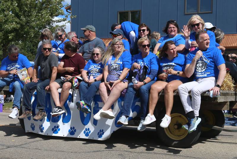The Princeton High School class of 1985 rides on a float during the 54th annual Homestead Festival parade on Saturday, Sept. 6, 2025 in Princeton.