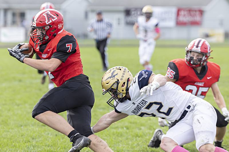 Amboy’s Troy Anderson runs back his interception against Hiawatha Saturday, Oct. 28, 2023 in the I8FA playoffs in Amboy.