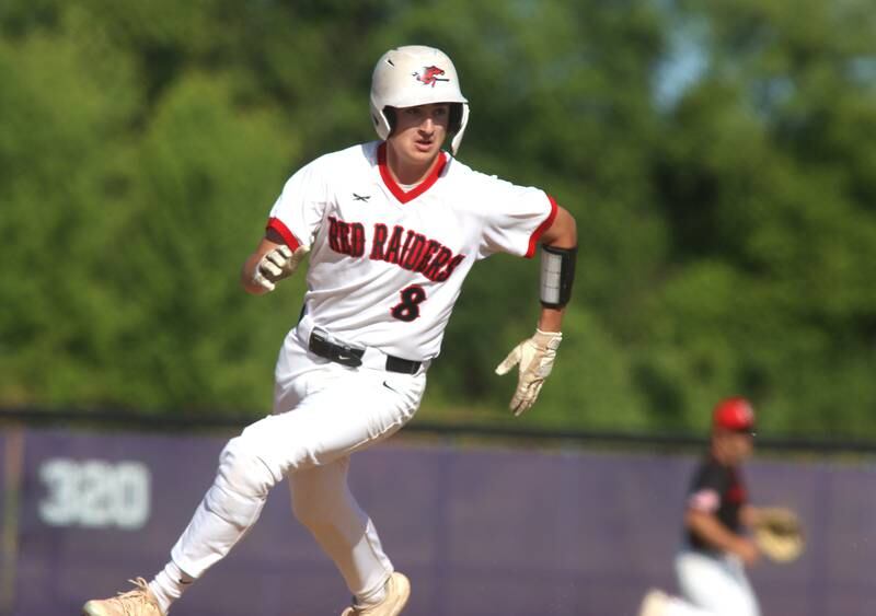 Huntley’s Ryan Dabe runs the bases against Barrington in sectional semifinal baseball action at Hampshire Wednesday.