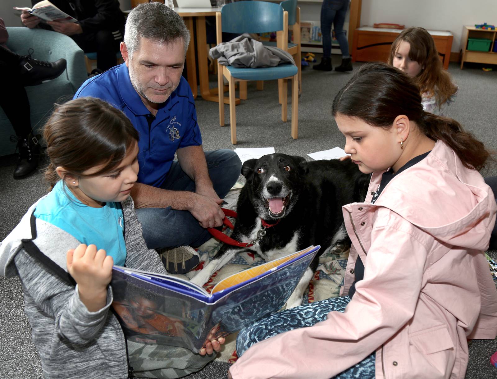 Photos Reading to Rover in Sugar Grove Shaw Local