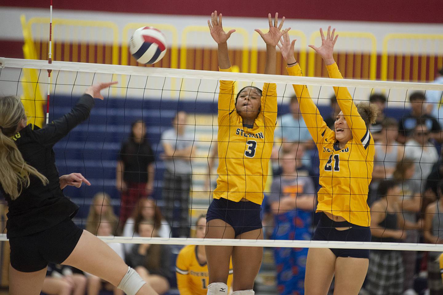 Sterling’s Delali Amankwa and Kirra Gibson go up to block a shot Thursday, Sept. 15, 2022 against Galesburg.
