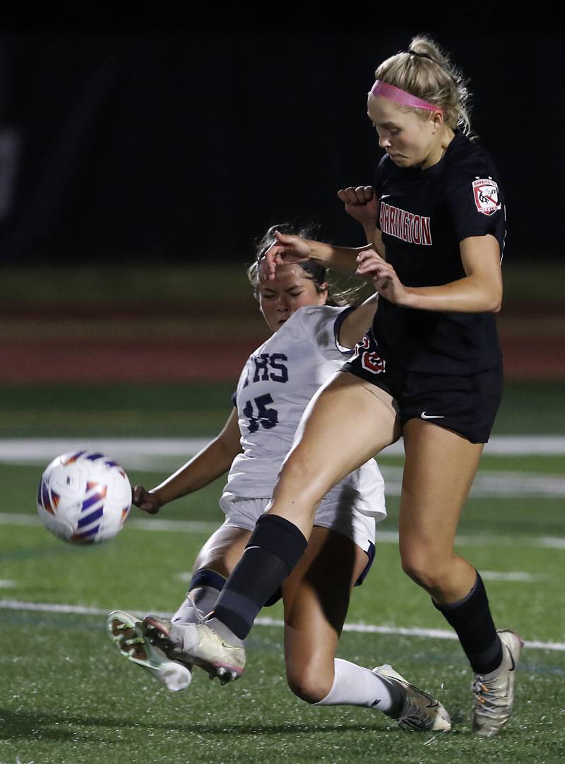 O'Fallon's Lailyn Patterson kicks the ball away from Barrington's Brooke Brown during the IHSA Class 3A state championship match at North Central College in Naperville on Saturday, June 3, 2023.