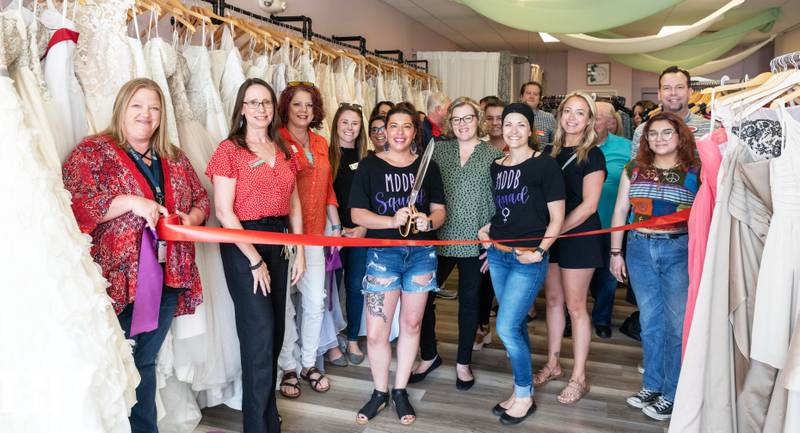The Yorkville Area Chamber of Commerce recently joined a multi-chamber ribbon cutting in honor of My Daughter’s Dress Boutique opening their Bridal Boutique, located at1569 Sycamore Road, Yorkville. Guests thumbed through the great number of wedding gowns and enjoyed networking over refreshments. My Daughter’s Dress Boutique mission is to make sure every girl feels beautiful on their special day without the huge price tag. Learn more at https://mydaughtersdress.org/