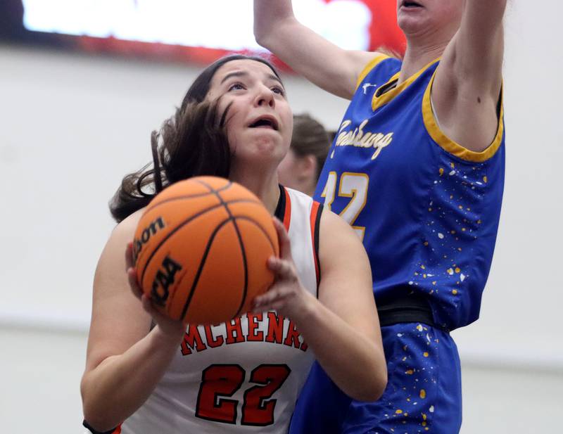 McHenry’s Brooklyn Anderson battles against Johnsburg in varsity girls basketball on Saturday, Jan. 4, 2025, at McHenry High School in McHenry.