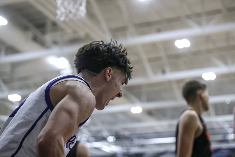 Plano's Ethan Taxis (3) reacts after being fouled during a made basket during their basketball game between Sandwich at Plano Tuesday, Dec 9, 2025 in Plano.