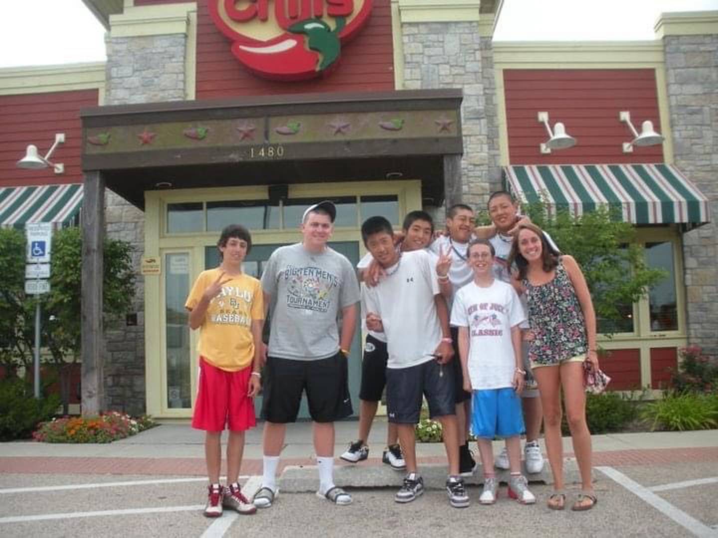 Patrick O'Connor (from left), Tom O'Connor, Shoki Fujino, Yuki Inami, Asato Hirokane, Brendan O'Connor and Kazuma Okamoto in front of Chili's in Algonquin during the Japanese ballplayers' visit in 2011. Photo courtesy of the O'Connor family