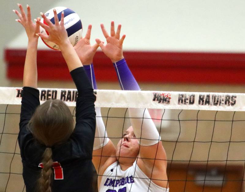 Hampshire’s Hailey Homola, right, and Huntley’s Riley Galanis tussle at the net in girls varsity volleyball at Huntley High School on Thursday, October 23, 2025.