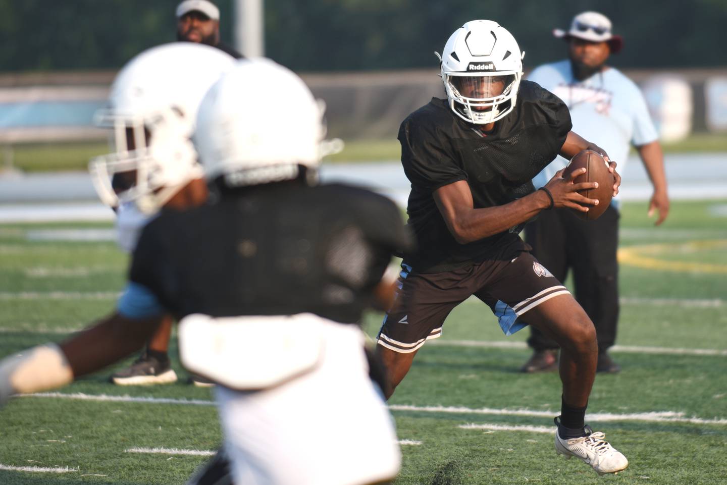 Kankakee's Phillip Turner scrambles during a scrimmage at the Kays' summer camp Thursday, July 31, 2025.
