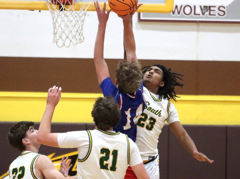 Crystal Lake South’s David McFadden blocks against  Lakes in varsity boys basketball Hinkle Holiday Classic action on Friday, Dec. 26, 2025, at Jacobs High School in Algonquin.