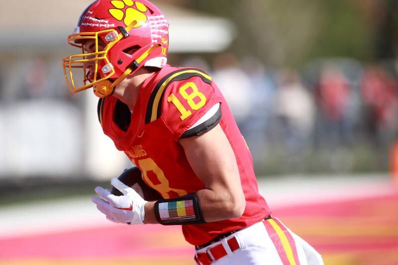 Batavia’s C.J. Valente makes a catch and runs it in for a touchdown during the Class 7A second round playoff game against Lincoln-Way Central in Batavia on Saturday, Nov. 4, 2023.