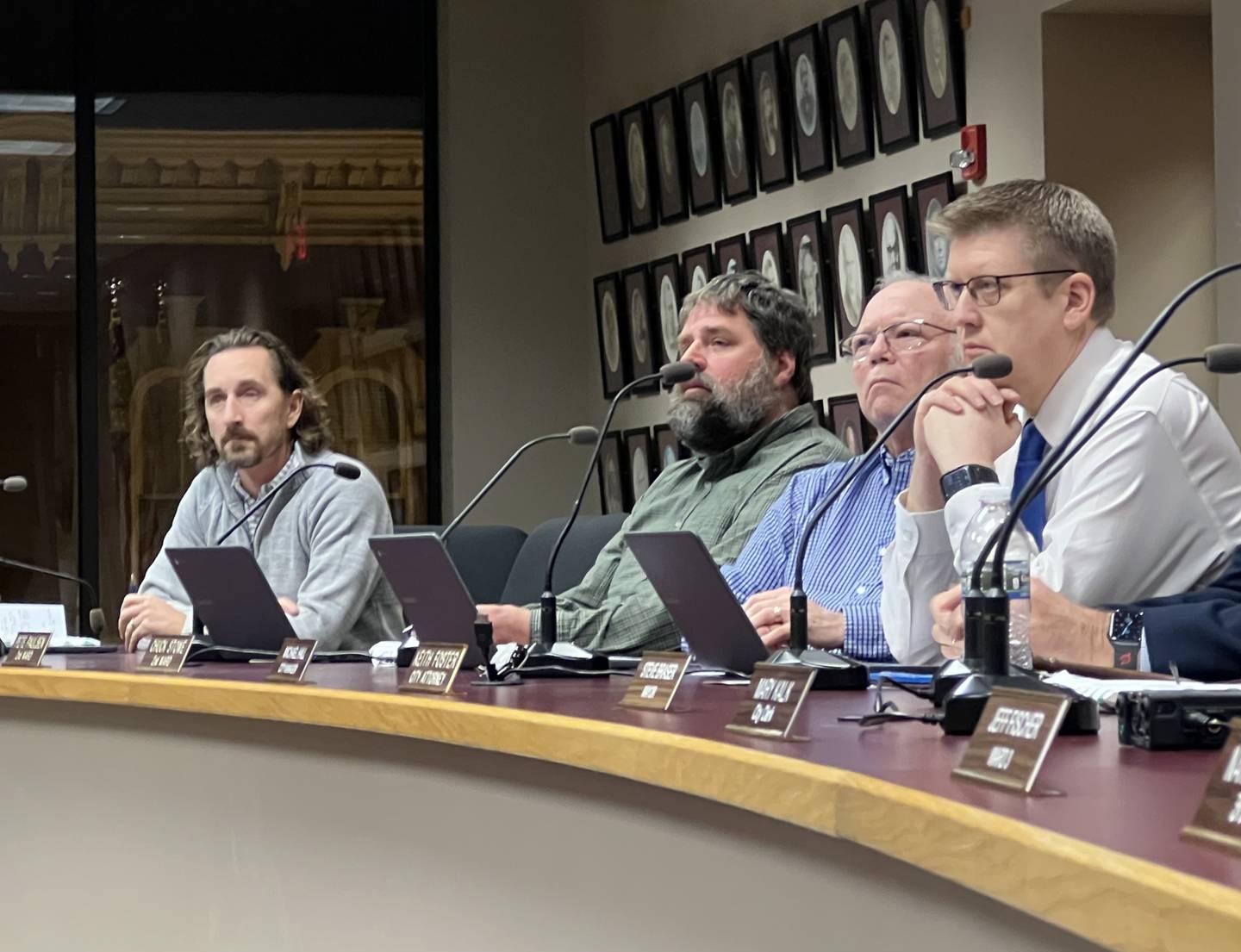 From left to right: First Ward Alderman Josh Huseman, Second Ward Alderman Pete Paulsen, Second Ward Alderman Chuck Stowe and Sycamore City Managaer Michael Hall list during the public comment period of the Dec. 19 Sycamore City Council meeting.