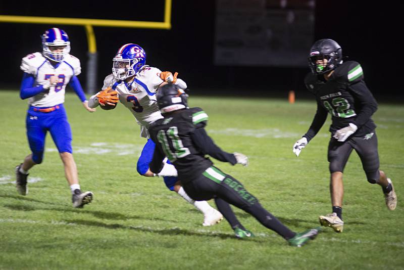 Genoa-Kingston’s Brody Engel picks up big yards on his way to a touchdown early in the second quarter Friday, Sept. 23, 2022 against Rock Falls.