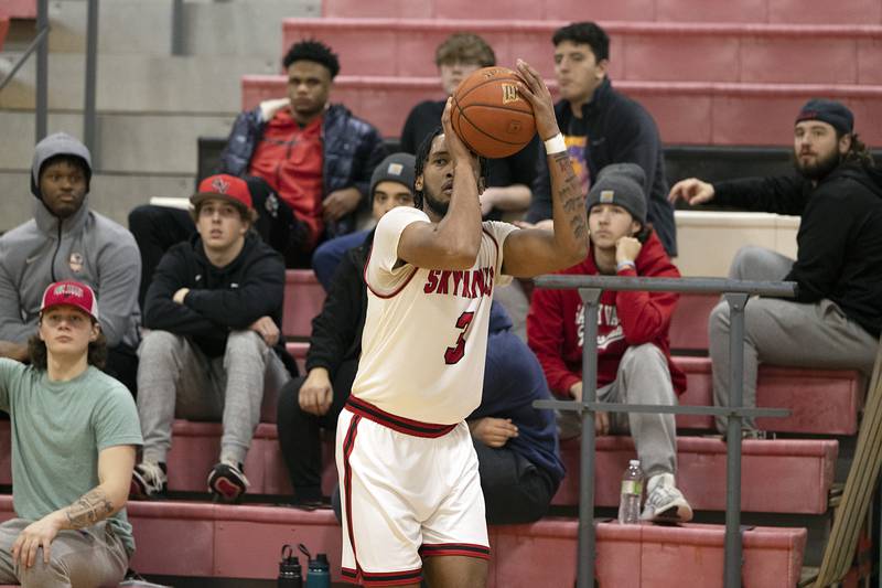 Sauk Valley College’s Davin Fields-Johnson puts up a three point shot against Indian Hills Monday, Jan. 30, 2023.