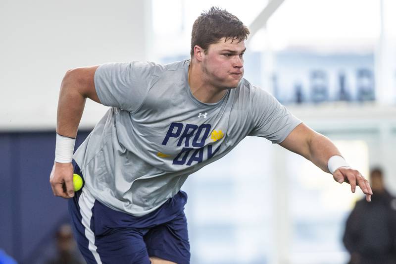 Notre Dame offensive tackle Joe Alt runs a drill during NFL pro day football workouts in South Bend, Ind., Thursday, March 21, 2024. (AP Photo/Michael Caterina)