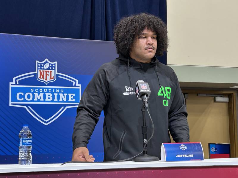 Bolingbrook alumnus and Cincinnati offensive lineman John Williams speaks with reporters at the NFL Combine in Indianapolis on March 1.