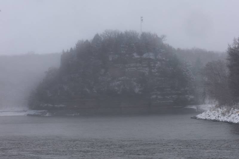 Heavy snow falls around Starved Rock over the Illinois River on Saturday, Nov. 29, 2025 at Starved Rock State Park.