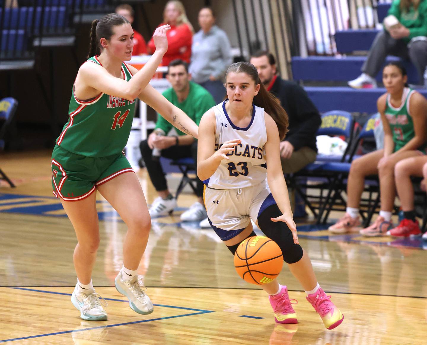 Somonauk/Leland's Ashley McCoy drives by La Salle-Peru's Drew Depenbrock during a game earlier this season in the Tim Humes Breakout girls basketball tournament at Somonauk High School.