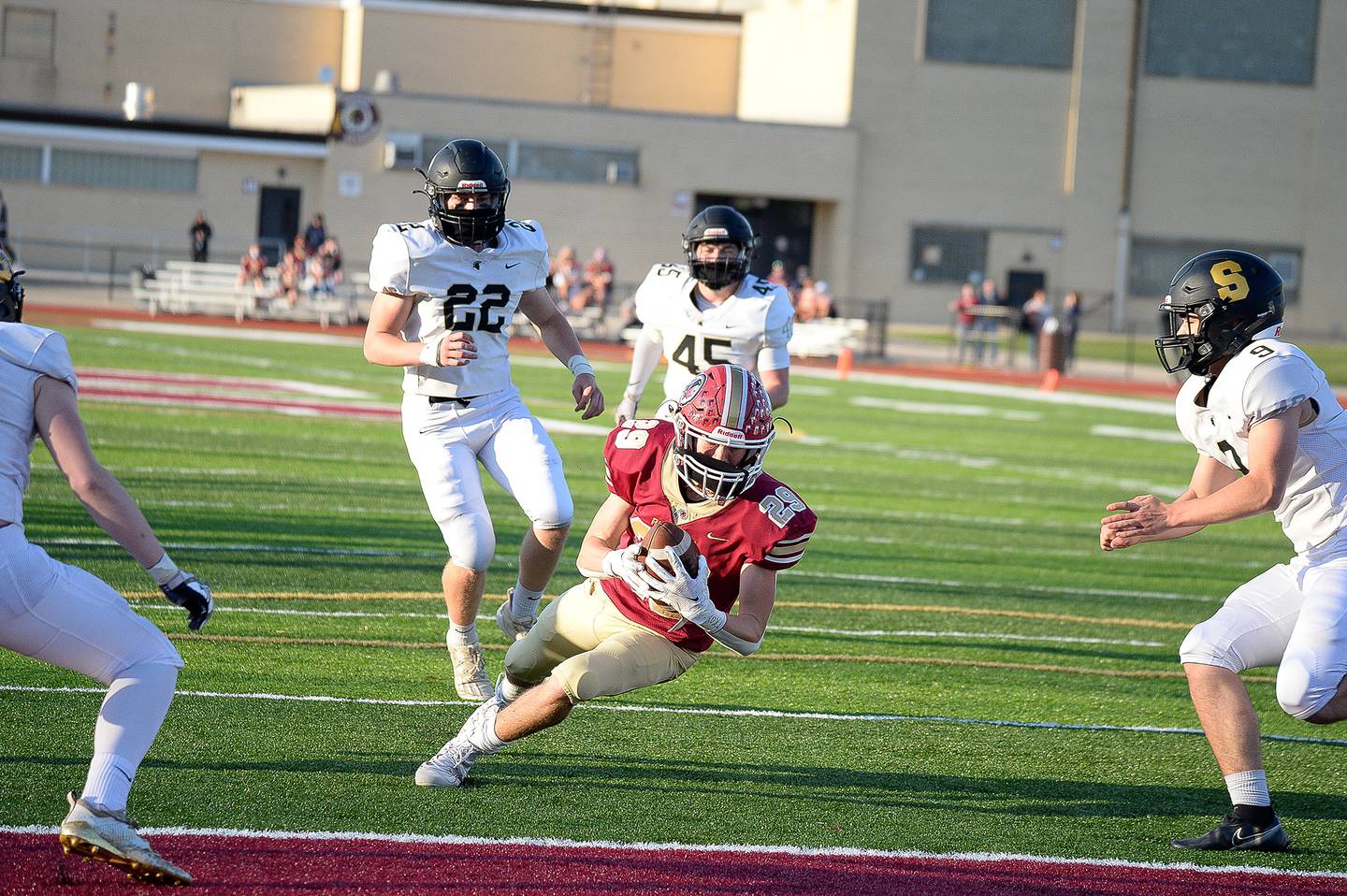 Morris' Aidan Romak dives into the end zone for a 16-yard touchdown Friday in a 21-14 loss to Sycamore.