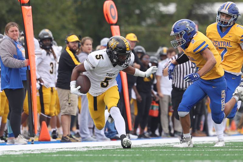 Joliet West’s Landon Mars heads upfield after a catch against Joliet Central on Saturday, Sept. 28, 2024 in Joliet.