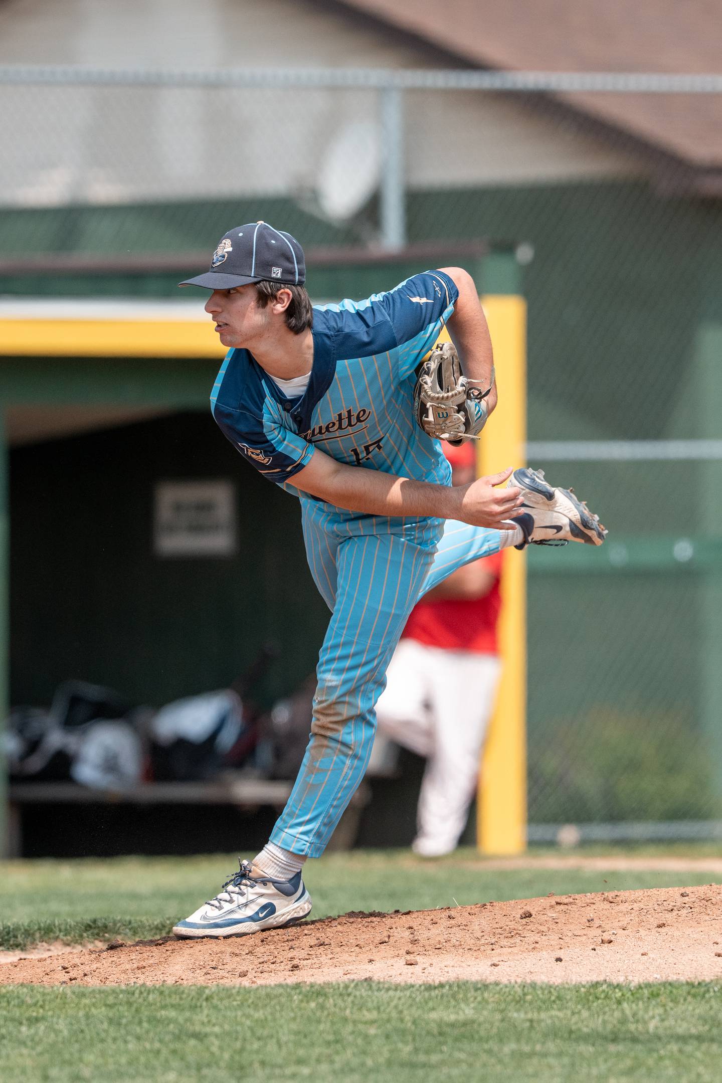 Marquette pitcher Alec Novotney (15) pitches the ball in the first inning at Trout Park in Elgin, IL on Saturday May 31st, 2025.  Both teams competed to take home the 1A Sectional Championship Trophy.  Final Score: Marquette 5, Aurora Christian 1