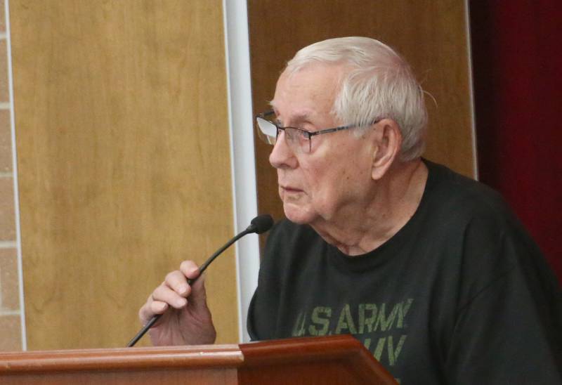 Engene Lee speaks to the Illinois Health Facilities and Services Review Board during a public hearing regarding OSF St. Elizabeth Hospital's plans to reduce services on Tuesday, June 10, at Central Intermediate School in Ottawa.