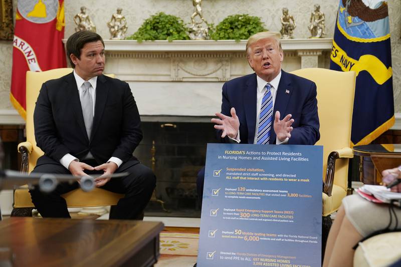 FILE - President Donald Trump speaks during a meeting with Gov. Ron DeSantis, R-Fla., in the Oval Office of the White House, April 28, 2020, in Washington. (AP Photo/Evan Vucci, File)