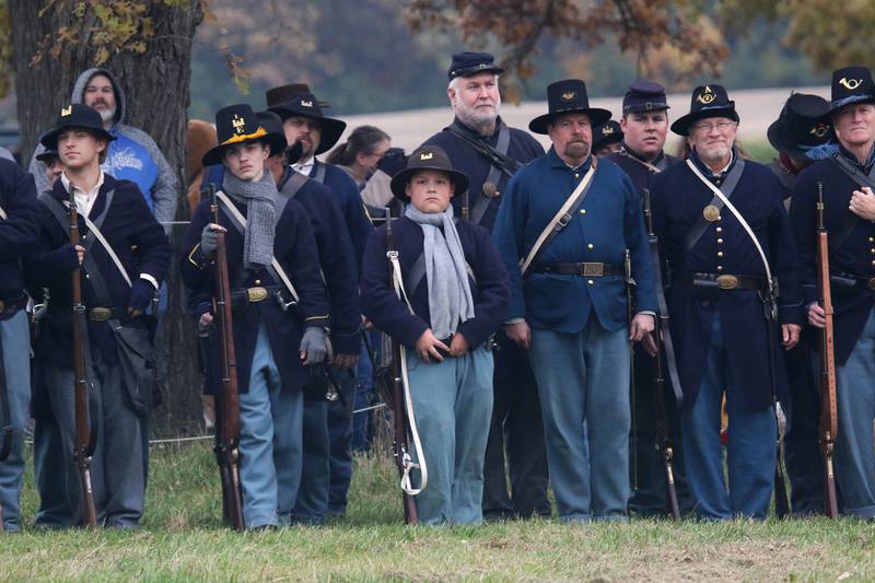 Union soldiers line up as they prepare to fight against the Confederates in the Battle of Gettysburg during Hainesville’s Civil War Encampment & Battle at the Northbrook Sports Club on October 21st in Hainesville. 
Photo by Candace H. Johnson for Shaw Local News Network