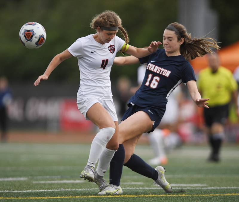Lincoln-Way Central’s Christine Erdman and Evanston’s Carly Menocal compete in the Class 3A IHSA state girls soccer third-place game in Naperville on Saturday, June 4, 2022.