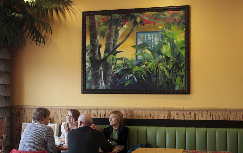 Customers Sue Wolfsmith (from right), Christine Wolfsmith, George Terpska and Sharon Terpska sit down for lunch Friday at Tropical Smoothie Café in Huntley.