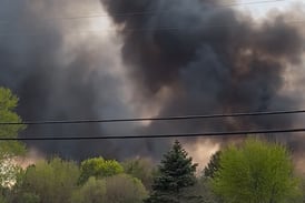 Brush fire burns over 100 acres in Island Lake
