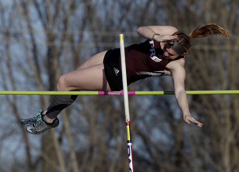 Prairie Ridge’s Haylee Yelle competes in the pole vault Thursday, April 21, 2022, during the McHenry County Track and Field Meet at Richmond-Burton High School.