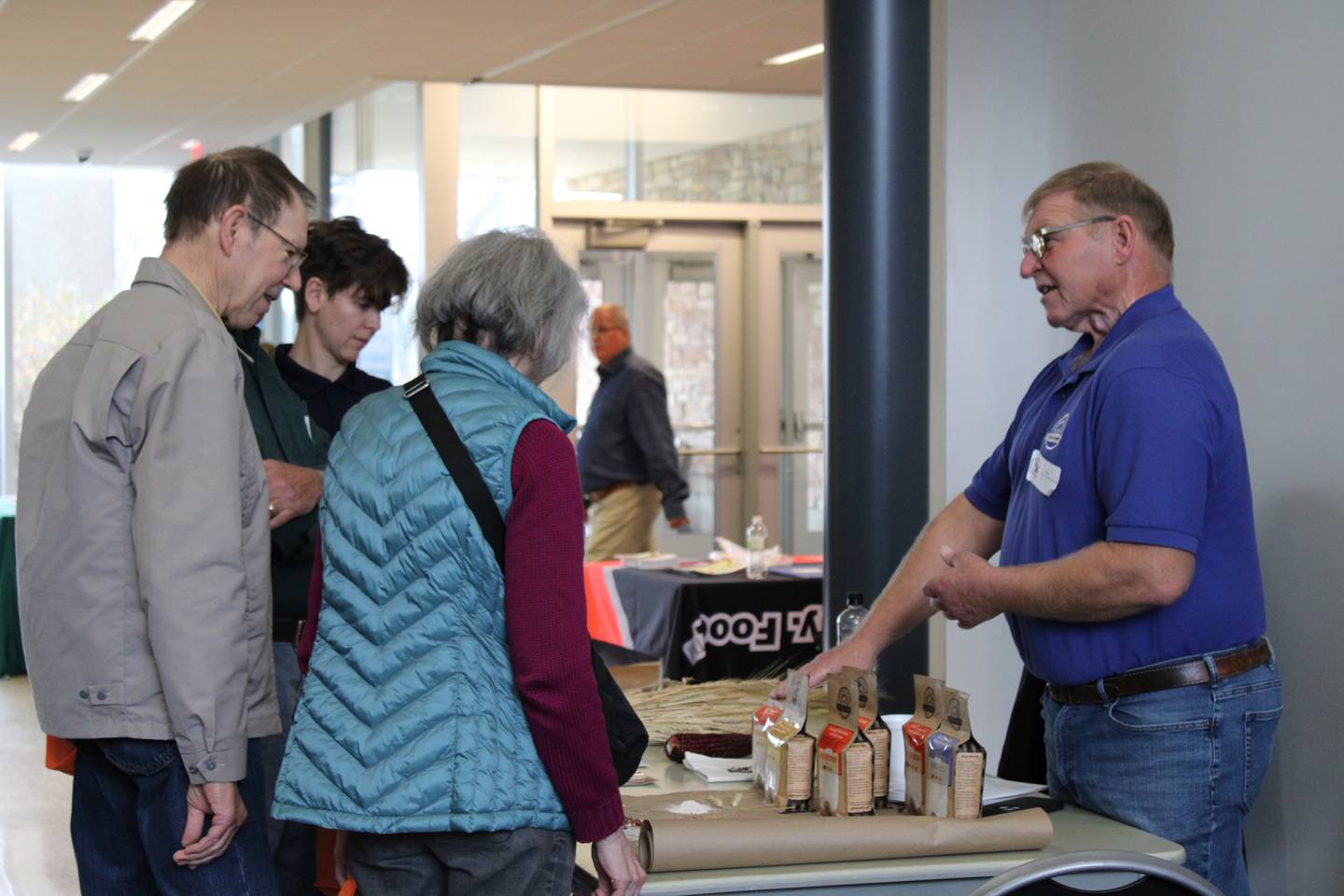 Attendees learn about resources at an organization’s booth.