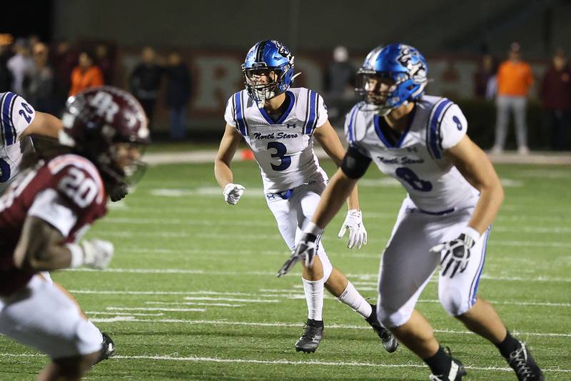 St. Charles North's Dan Escaro (3) looks to make a play against Brother Rice in the third round of the playoffs on Saturday, Nov. 15, 2025 in Chicago.
