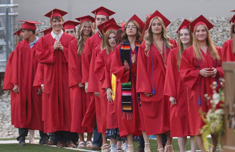 La Salle-Peru Township High School graduates walk to receive their diplomas during the L-P Class of 2026 commencement ceremony on Thursday, May 14, 2026 at Howard Fellows Stadium.
