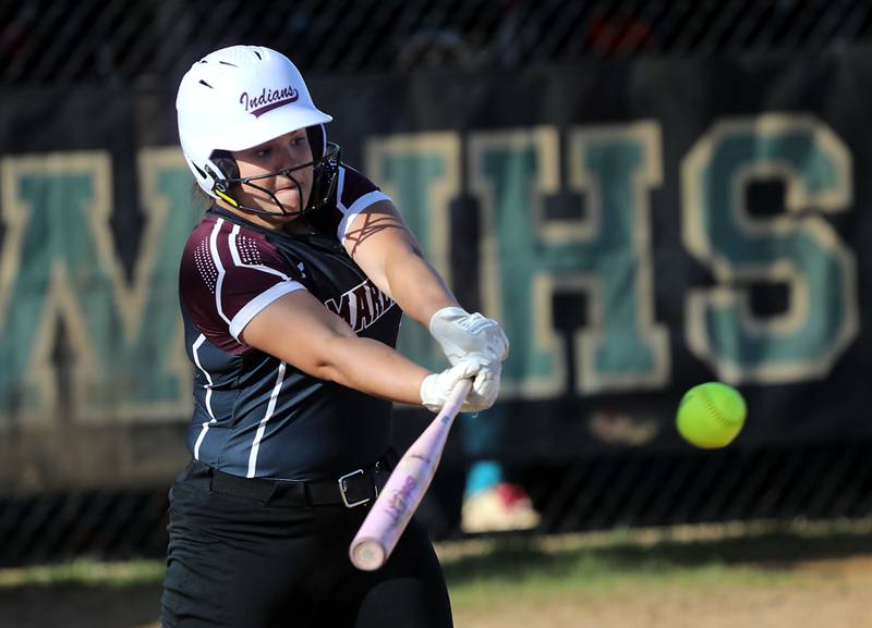 Marengo's Mia Miceli hits the ball during a Kishwaukee River Conference softball game against Woodstock North on Tuesday, April 28 , 2026, at Woodstock North High School.