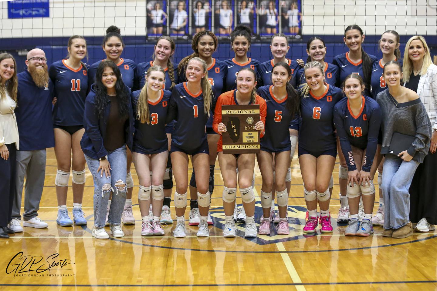 Oswego poses with the Class 4A Regional Final plaque after defeating Neuqua Valley. Oct 30, 2025 in Plainfield.