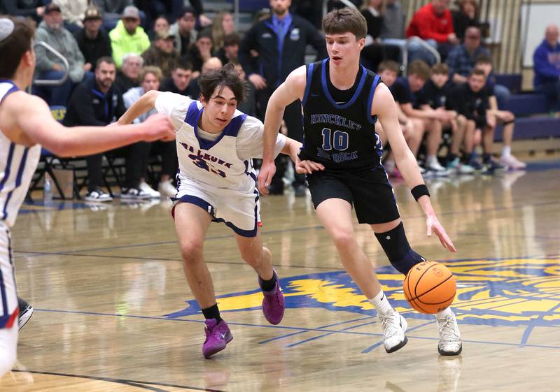 Hinckley-Big Rock's Max Hintzsche drives by Ida Crown’s Ayden Mishkin during their Class 1A sectional game Wednesday, March 5, 2025, at Somonauk High School.