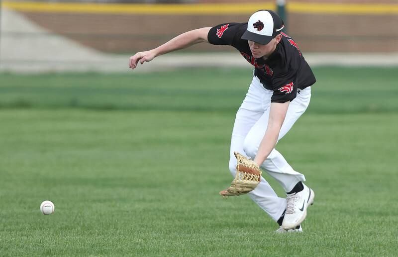 Indian Creek's Jakob McNally fields a ground ball during their game Thursday, April 20, 2023, against Hiawatha at Indian Creek High School in Shabbona. The game was stopped in the first inning due to weather.