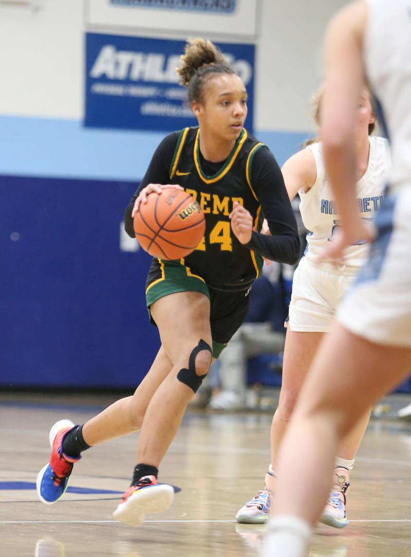 Fremd's Kace Urlacher (44) drives the ball during the girls varsity basketball game between Fremd and Nazareth on Monday, Jan. 9, 2023 in La Grange Park, IL.
