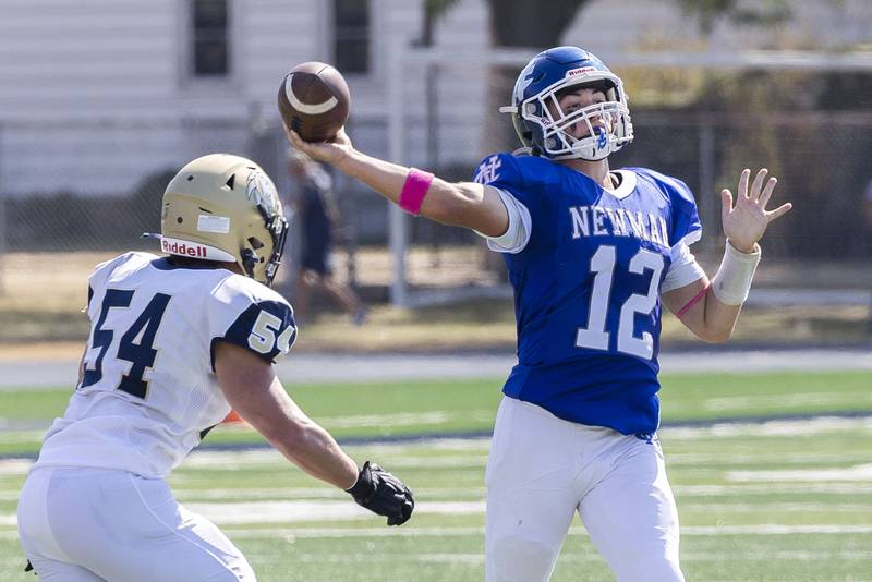 Newman’s Evan Bushman fires a pass against Mercer County Saturday, October 4, 2025.