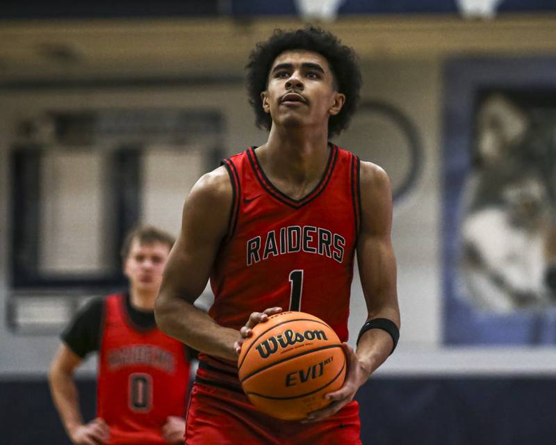 Bolingbrook's Brady Pettigrew (1) shoots a free throw during their basketball game between Bolingbrook at Oswego East Friday, Jan 30, 2026 in Oswego.