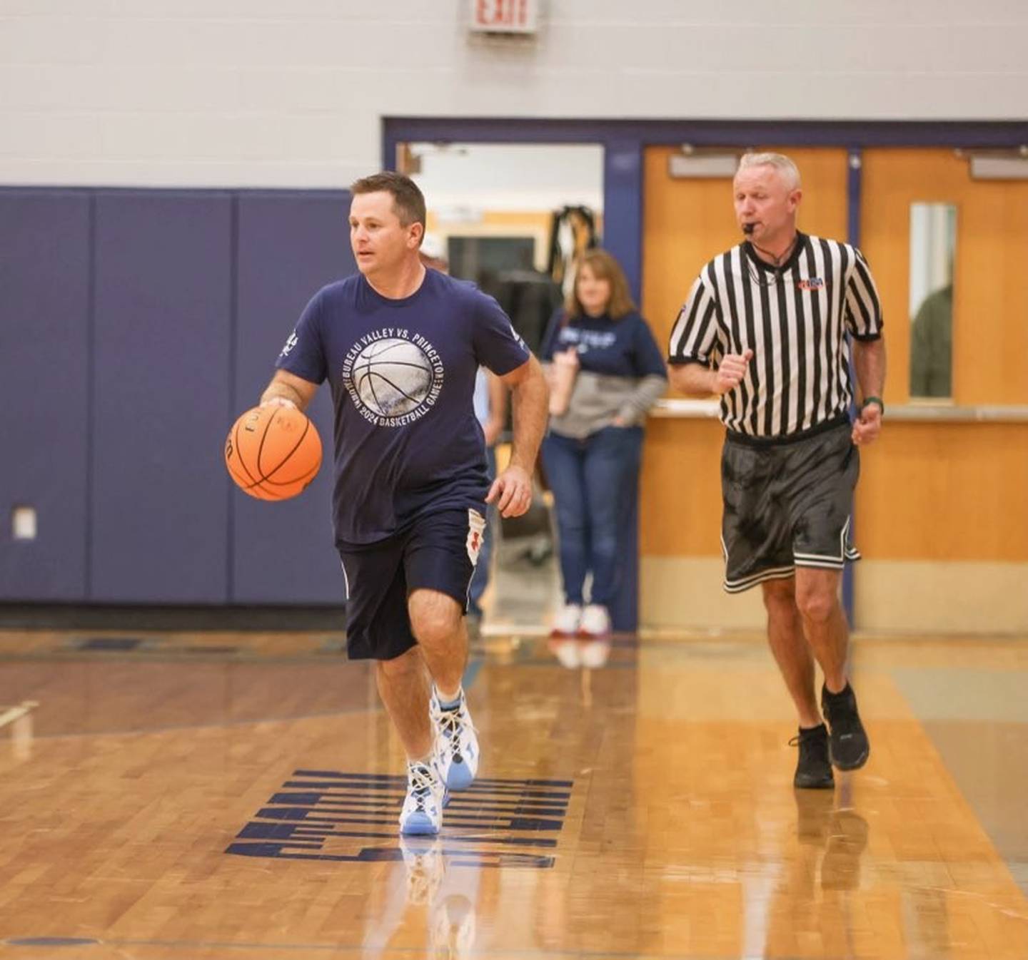 BV alum Matt Wiggim (1998) brings the ball upcourt during Sunday's Alumni Game at the Storm Cellar.