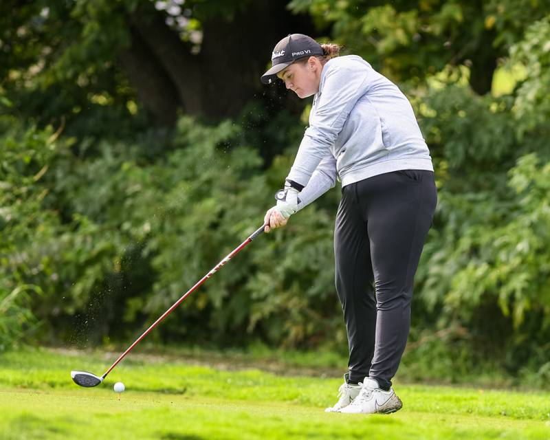 Neuqua Valley Madison Coffey tee’s off the green during the regional match on Thursday Sep. 28, 2023 held at Whitetaile Ridge in Yorkville.
