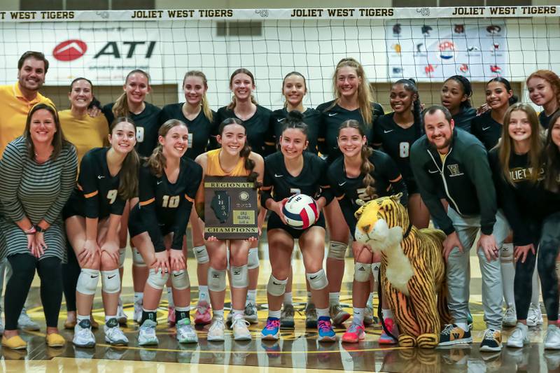 Joliet West poses with the regional final plaque after defeating Bolingbrook. Oct 26, 2023.