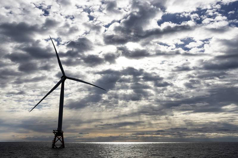 FILE - A Block Island Wind Farm turbine operates, Dec. 7, 2023, off the coast of Block Island, R.I., during a tour of the South Fork Wind farm organized by Orsted. Unfounded claims about offshore wind threatening whales have surfaced as a flashpoint in the fight over the future of renewable energy.