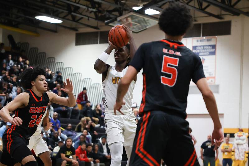 Joliet West’s Justus McNair puts up the midrange shot against Plainfield East on Friday, Dec. 8th, 2023 in Joliet.