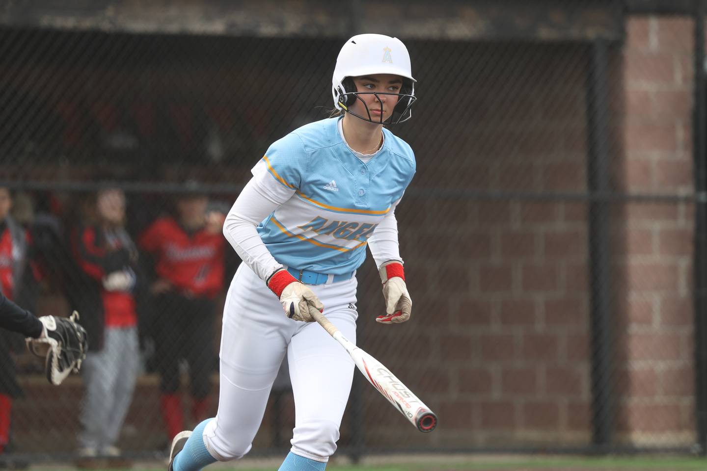 Joliet Catholic’s Alina Schlageter draws a walk against Bolingbrook on Monday, April 3, 2023.